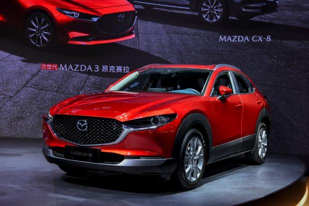 <a href=https://www.qzqcw.com/z/changan/ target=_blank class=infotextkey>长安</a><a href=https://www.qzqcw.com/z/mazida/ target=_blank class=infotextkey>马自达</a>10月销量增29 特色精品战略初见成效-图2